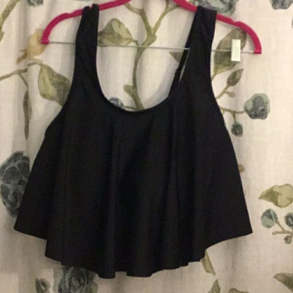 …Black swimsuit top only.